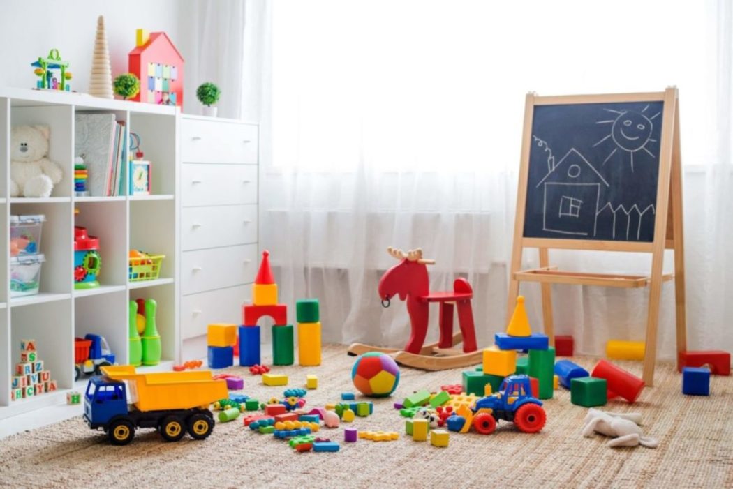 A child’s playroom in need of organization.
